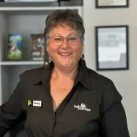 Shelley’s warm smile will be the first thing to welcome you when you arrive at our depot. |  Trail Journeys