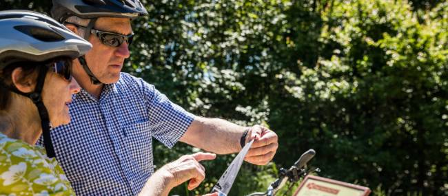 Planning the days' cycling on the Otago Central Rail Trail | Lachlan Gardiner